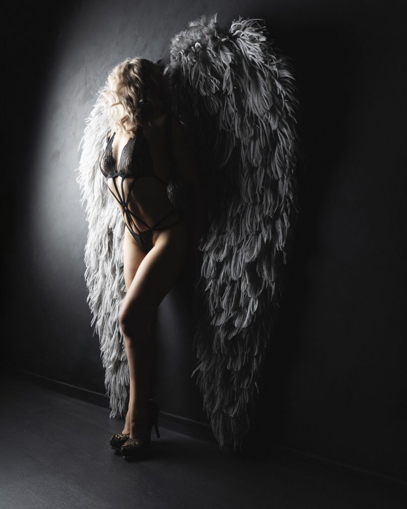 sensual angel wings pose