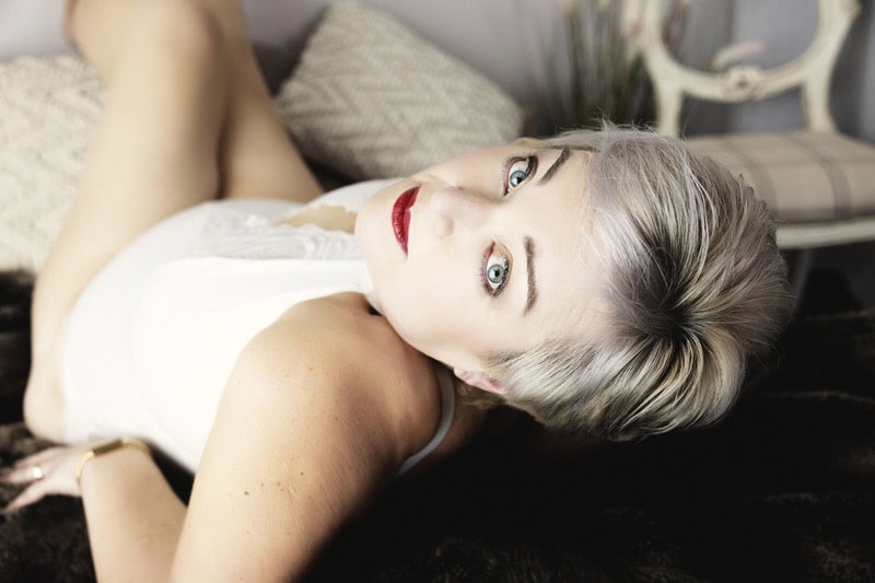 a woman lying on a couch
